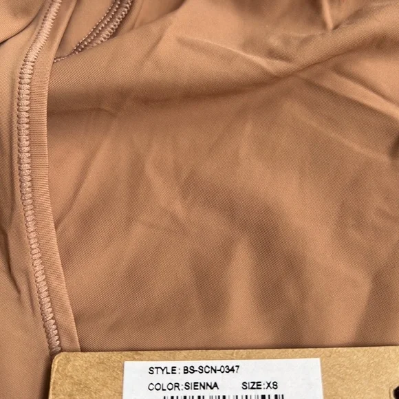 SKIMS Long Sleeve Bodysuit in Tan - Picture 9 of 9